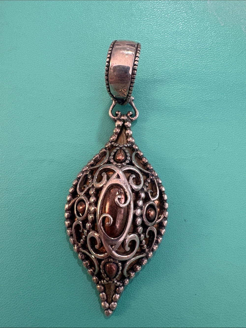 Sterling Silver Ornate Filigree Pendant with Brown Accents by Carolyn Pollack